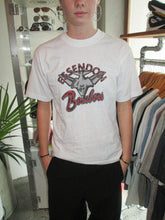 Load image into Gallery viewer, VINTAGE FILA BOMBERS GRAPHIC T SHIRT - S