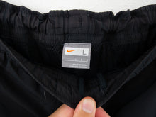 Load image into Gallery viewer, VINTAGE NIKE NYLON BAGGY TRACK PANTS - 30/32'