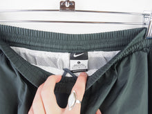 Load image into Gallery viewer, VINTAGE NIKE BAGGY DETAILED TRACKPANTS - L