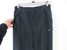 Load image into Gallery viewer, VINTAGE NIKE SWOOSH TRACKPANTS - M