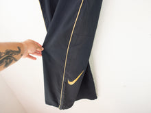 Load image into Gallery viewer, VINTAGE NIKE NYLON BAGGY TRACK PANTS - 34/36&#39;
