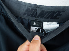 Load image into Gallery viewer, VINTAGE NIKE NYLON BAGGY TRACK PANTS - 34/36&#39;
