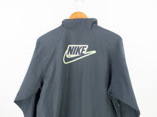Load image into Gallery viewer, VINTAGE NIKE BIG BACK LOGO WINDBREAKER - WMNS L
