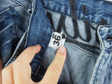 Load image into Gallery viewer, VINTAGE QUIKSILIVER EMBROIDERED DENIM JORTS - 36'
