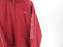 Load image into Gallery viewer, VINTAGE REEBOK ARM SPELLOUT WINDBREAKER - XL
