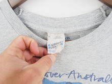 Load image into Gallery viewer, VINTAGE FOSTERS BEER SURF GRAPHIC T SHIRT - L

