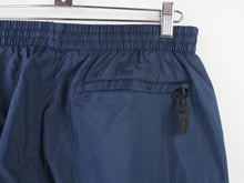 Load image into Gallery viewer, VINTAGE NIKE TECH BAGGY TRACKPANTS - M/L
