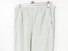 Load image into Gallery viewer, VINTAGE NIKE SWOOSH STRIPE TRACKPANTS - S

