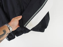 Load image into Gallery viewer, VINTAGE NIKE BGI SWOOSH WINDBREAKER - WMNS S/M
